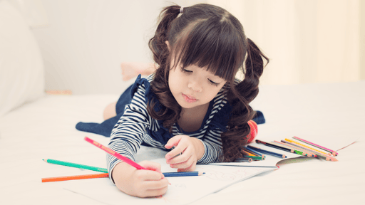Little girl doing artwork