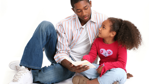 Man reading children's Bible with sister.