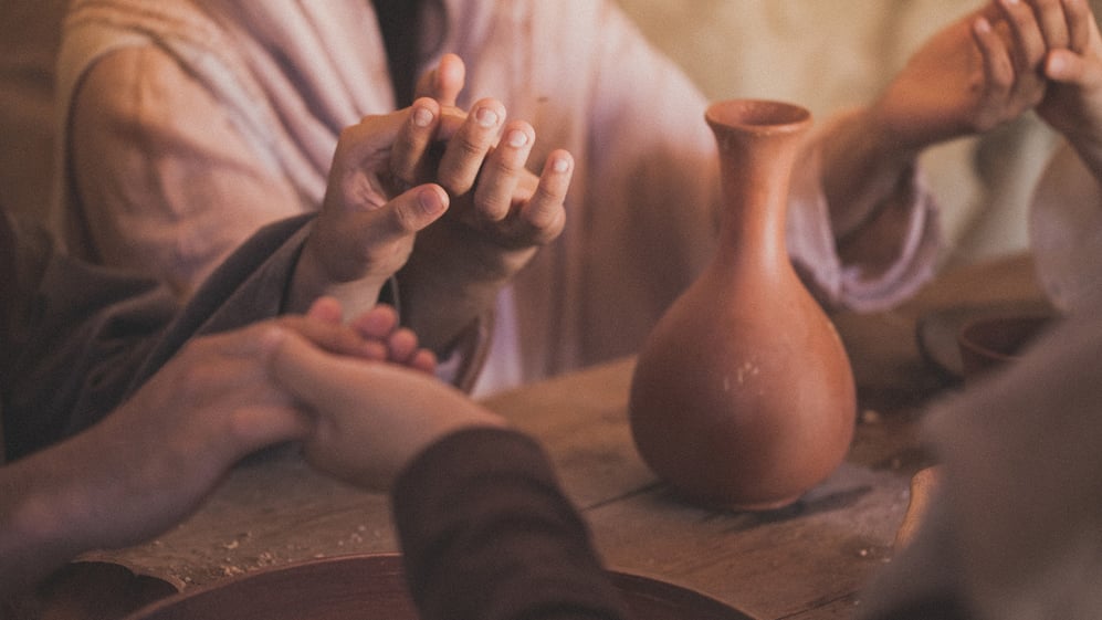 Jesus sharing a meal with others