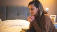 Woman glorifying God in hard times