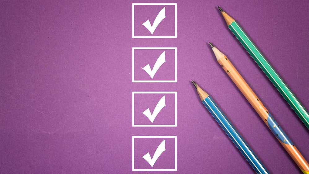Checklist on purple background