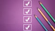 Checklist on purple background