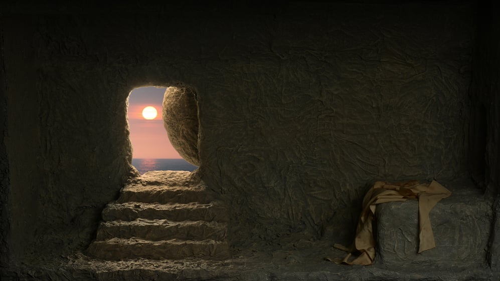Empty tomb with sunrise