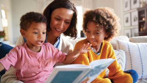 Mother reading The Nicene Creed: Illustrated for Families with her children