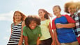 Preteen children smiling together
