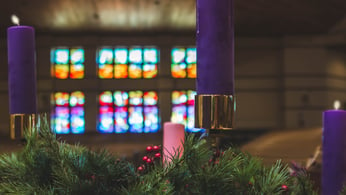 Advent candles in church sanctuary